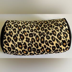 Leopard print messaging pillow.